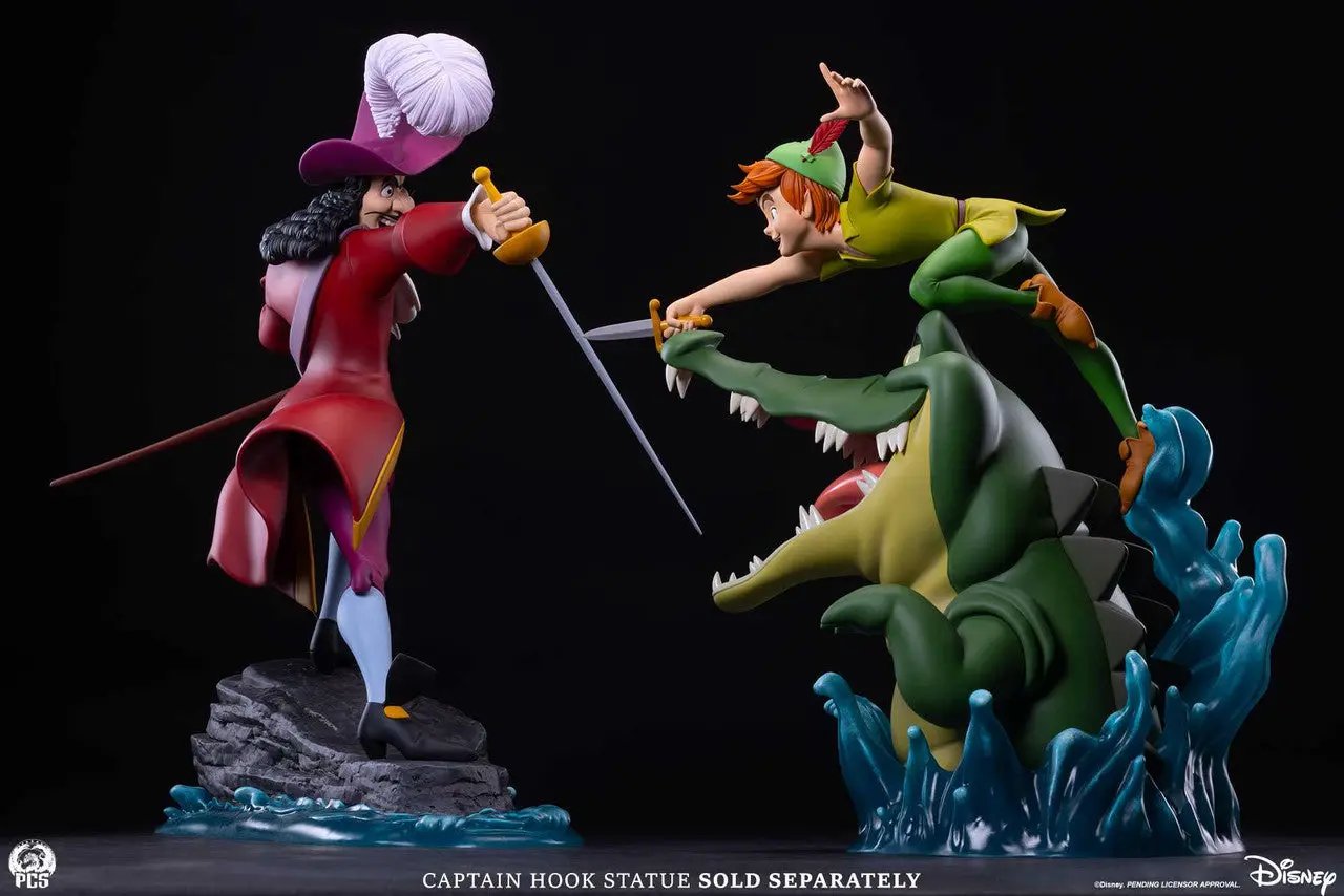 Peter Pan 1:5 Scale Statue by Premium Collectibles Studio; diorama of Peter Pan vs Captain Hook on rocky base.