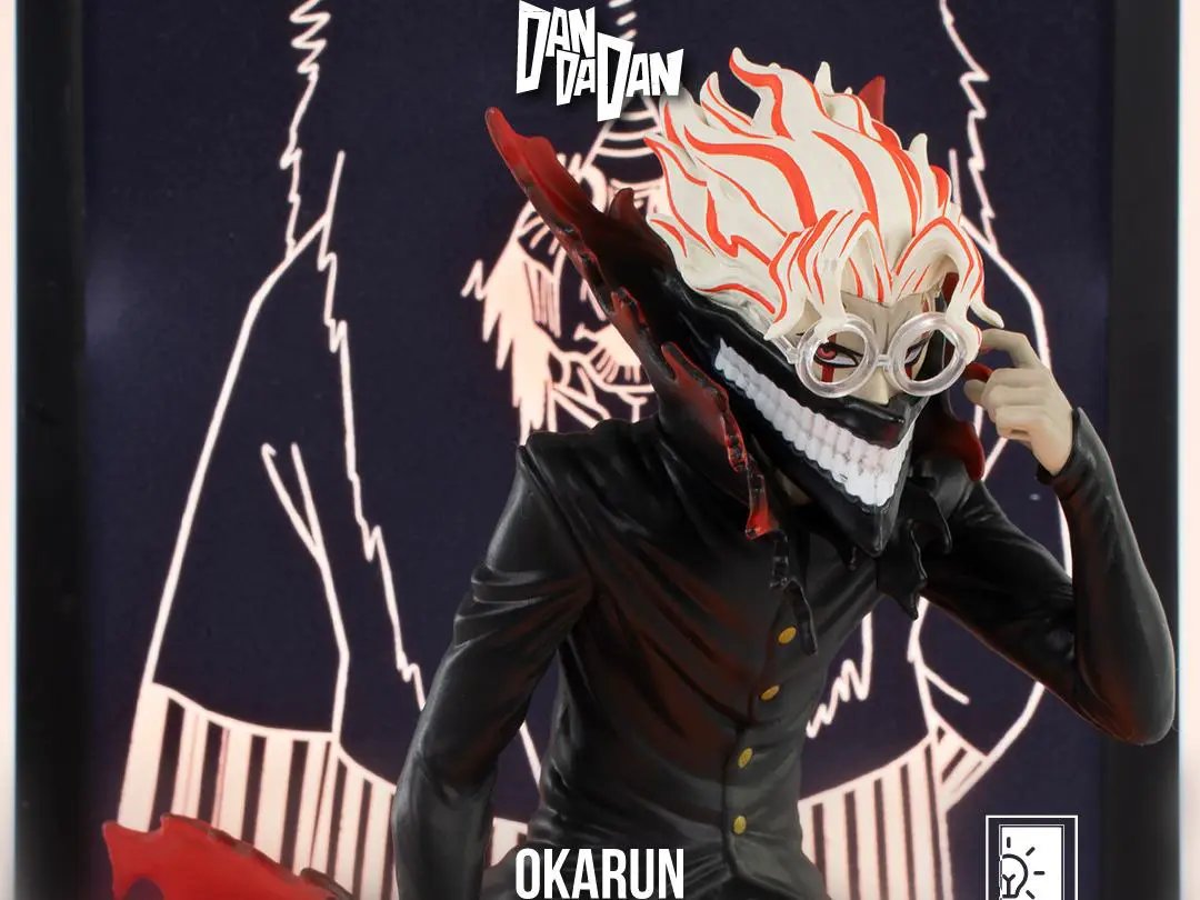 Tsume Dandadan Okarun Neon action figure, 25cm, black suit with red neon hair and round glasses.