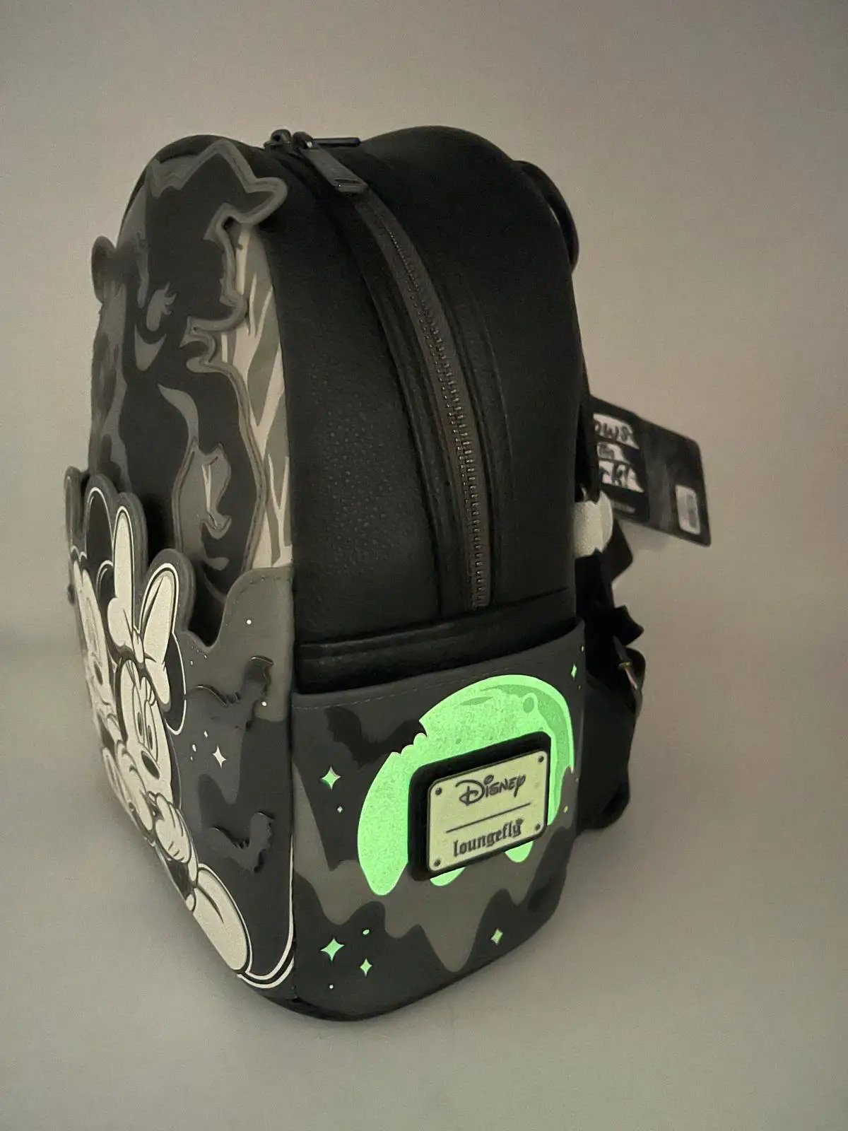 Mickey & Minnie Loungefly Mochila Mini Ghost glow backpack, black with glow-in-the-dark lime front pocket and Disney badge