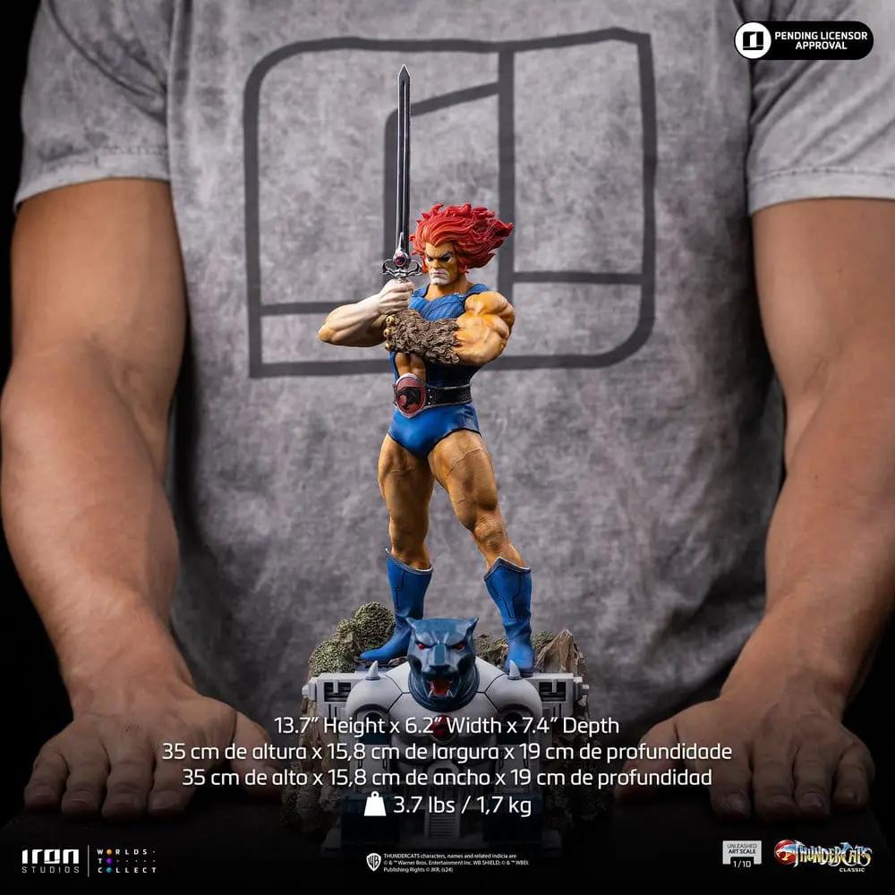 Iron Studios Lion-O ThunderCats 1/10 art scale statue with raised sword, blue outfit, on Thundercats base, 35 cm tall.