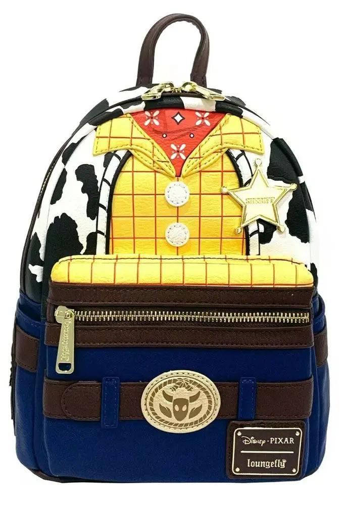 Loungefly Toy Story Woody backpack with blue base, cow-print sides, yellow plaid front, and gold hardware.