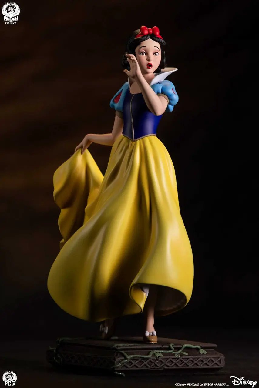 Snow White 1:5 scale statue by Premium Collectibles Studio; yellow gown, blue bodice, on ornate base