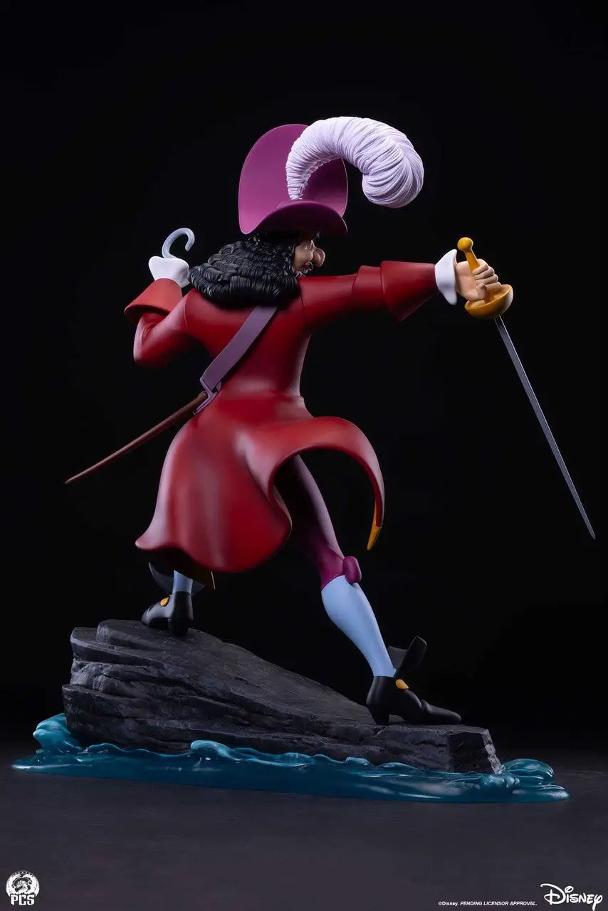 Captain Hook 1:5 scale statue by Premium Collectibles Studio; red coat, purple hat, white plume, sword on rocky base.