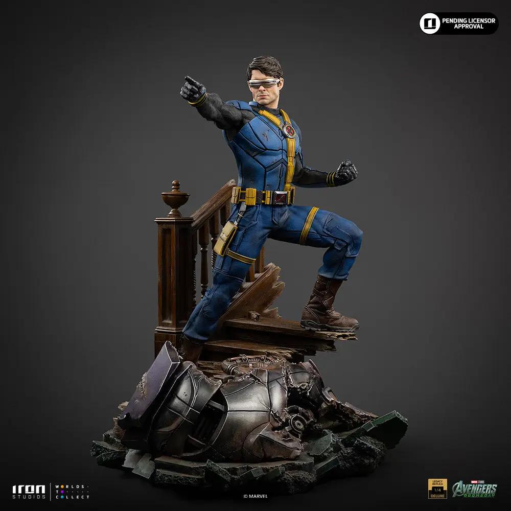 Statue Cyclops Deluxe ver. 1/4 scale by Iron Studios, blue suit with yellow accents, on rubble base.