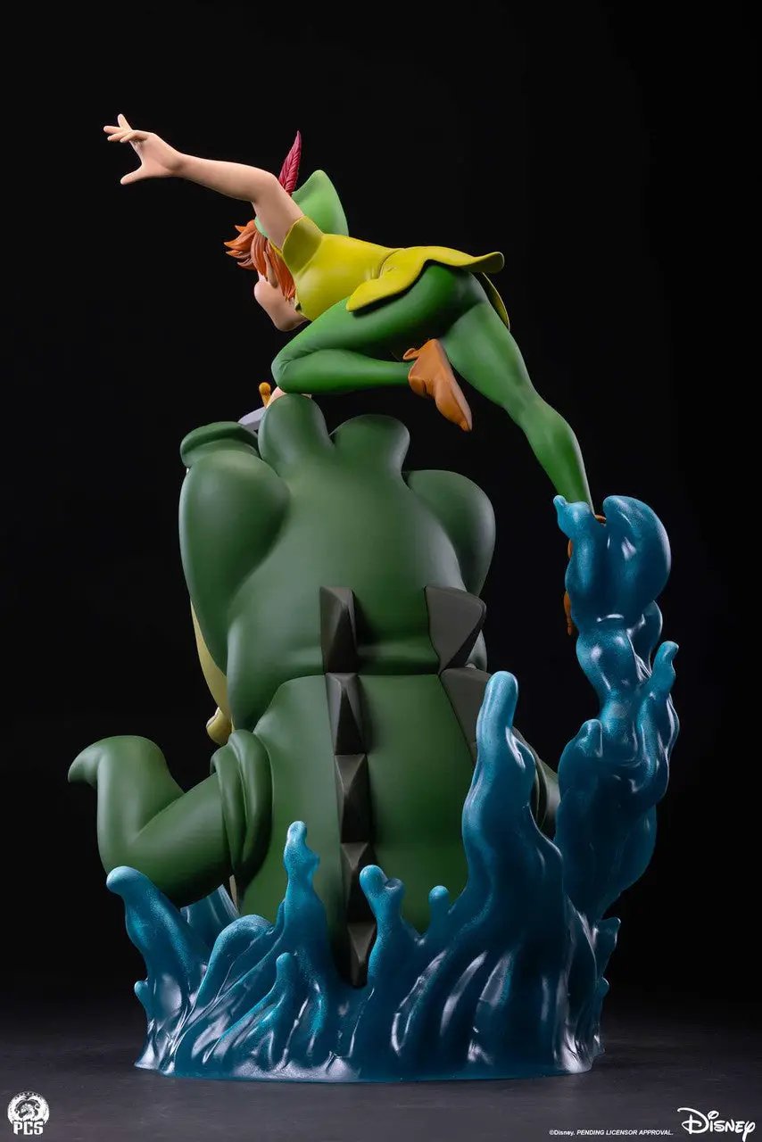 Peter Pan 1:5 scale statue by Premium Collectibles Studio, Peter Pan atop a green crocodile with blue wave base