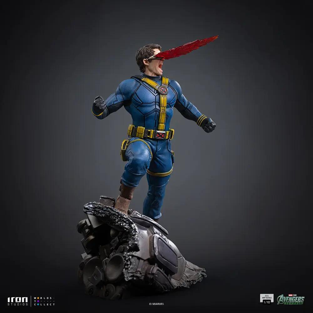 Statue Cyclops by Iron Studios, 1/10 scale, blue suit with yellow harness, shooting red optic beam atop a wrecked metal base.