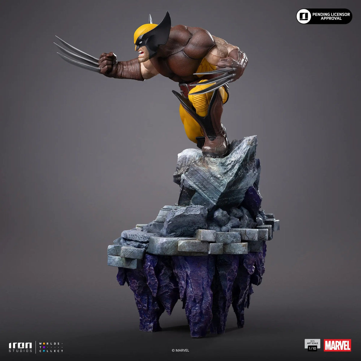 Wolverine statue on a rocky diorama base, yellow/brown suit, 1/10 scale, Iron Studios