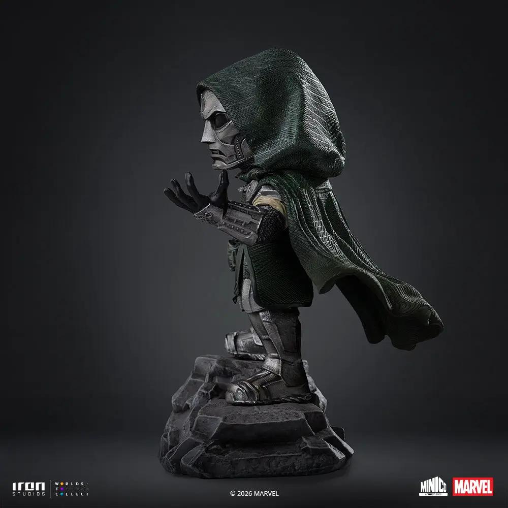 Statue of Doctor Doom from Marvel, Iron Studios Minico; armored figure with green cape on a rocky base