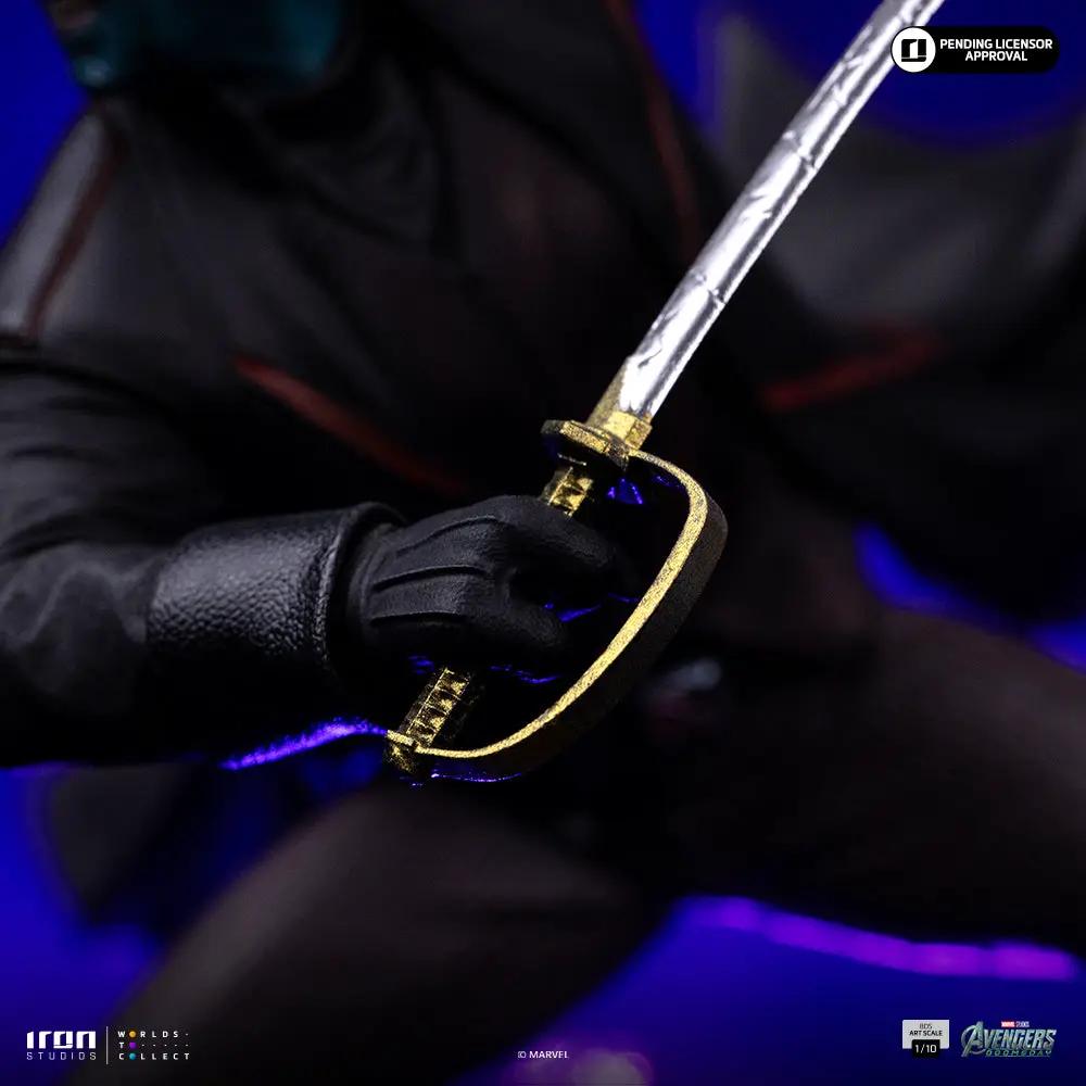 Statue Nightcrawler figure from Avengers: Doomsday by Iron Studios, gloved grip on a gold-trimmed sword, 1/10 scale.