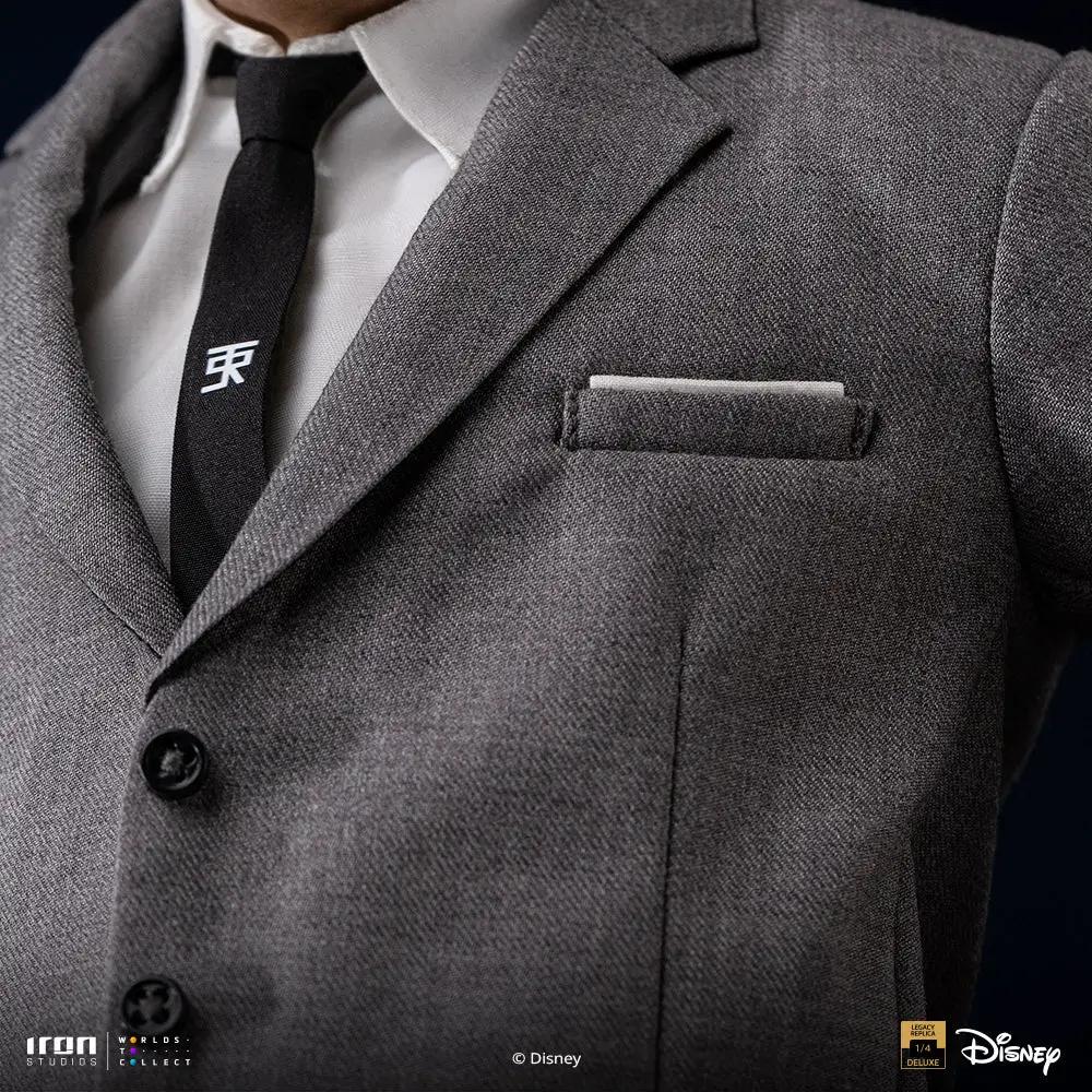 Statue by Iron Studios: gray suit with white shirt and black tie; Disney logo and Legacy Replica 1/4 badge visible