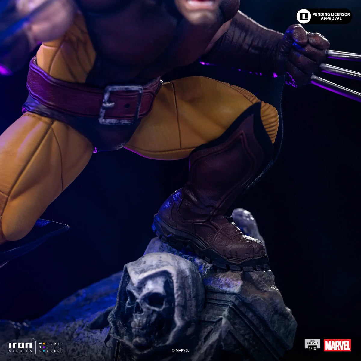 Statue Wolverine by Iron Studios, 1/10 scale Marvel diorama figure in yellow and brown suit on a rocky base
