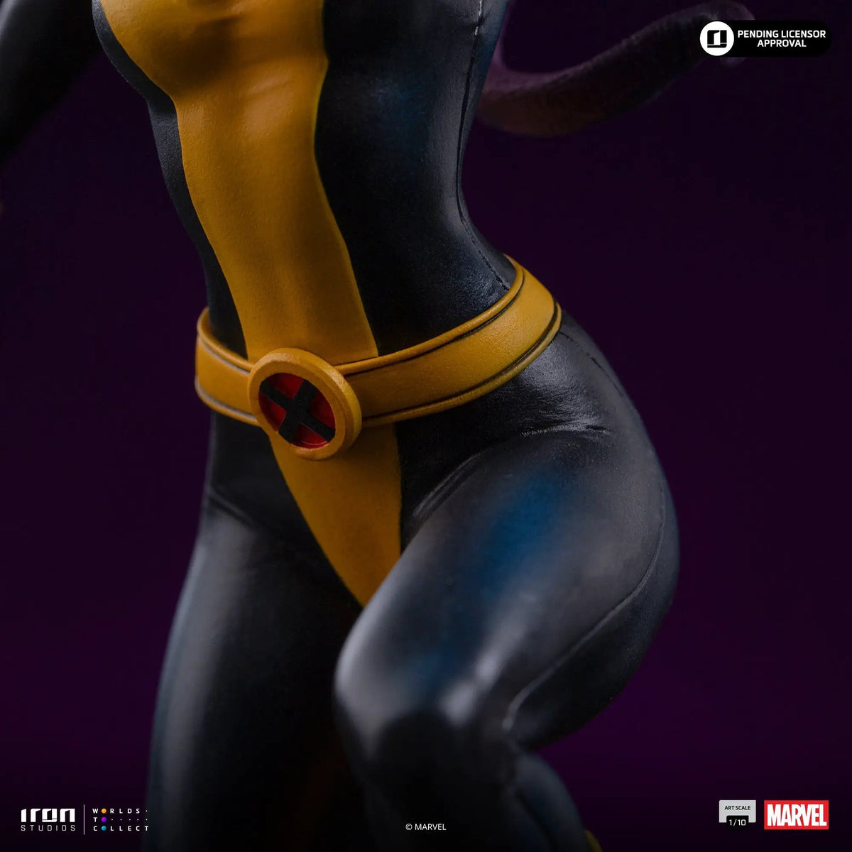 Statue Kitty Pryde & Lockheed from X-Men by Iron Studios; 1/10 scale, yellow and black suit, Marvel logo visible.