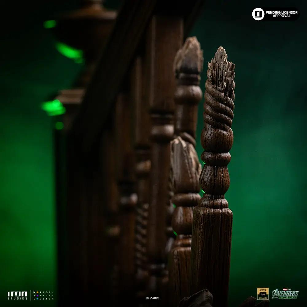 Statue Cyclops Deluxe ver. by Iron Studios; dark wood railing spindles on a green backdrop with Avengers branding.