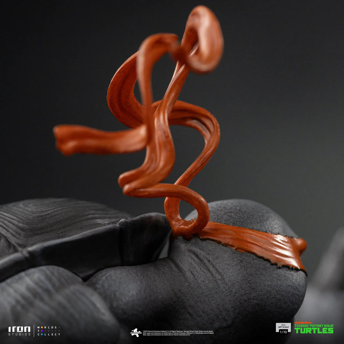 Michelangelo TMNT statue, black-and-white variant, Iron Studios BDS Art Scale 1/10; orange sculpted coils on dark base