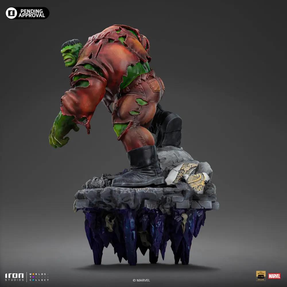 Statue Hulk Deluxe by Iron Studios; green Hulk in torn red shirt on a rocky diorama base with purple crystals.