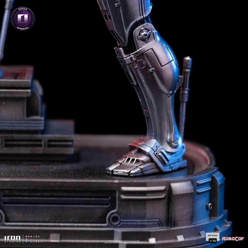 Robocop statue by Iron Studios, Art Scale 1/10, metallic silver-blue figure on round base.