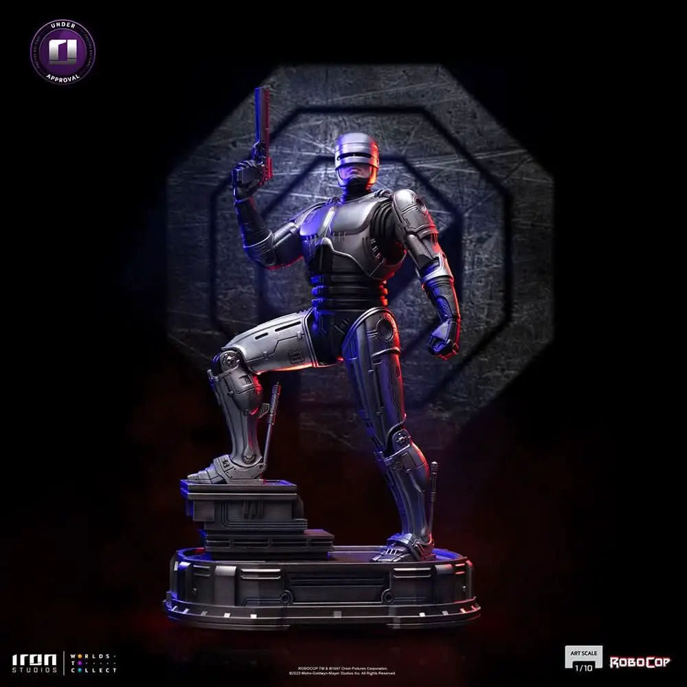 Robocop Art Scale 1/10 statue by Iron Studios on pedestal in metallic armor with blue-red lighting.