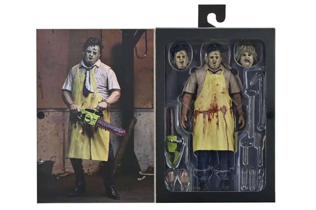 NECA Leatherface 50th Anniversary Ultimate Action Figure from Texas Chainsaw Massacre; yellow apron, extra heads.