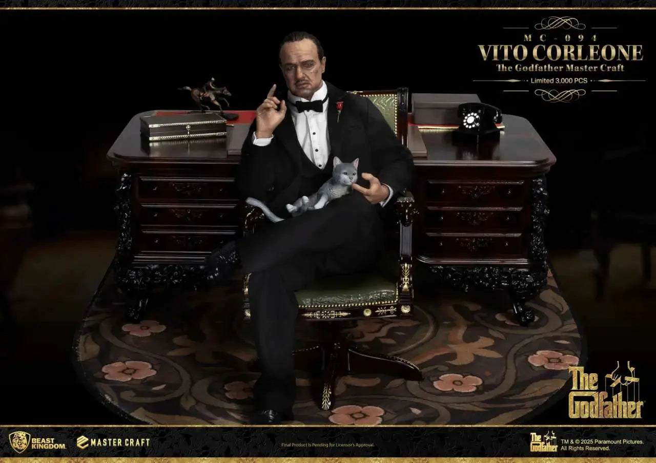 Beast Kingdom Master Craft Vito Corleone statue, seated at an ornate dark wood desk in a black tuxedo with a cat