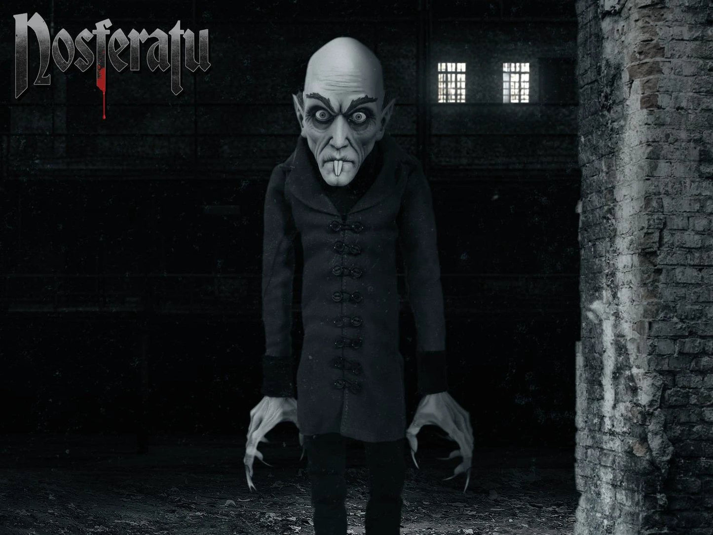 Nosferatu Mds Roto Plush 45 cm plush toy by Mezco Toys, grey-skinned vampire in a black coat.