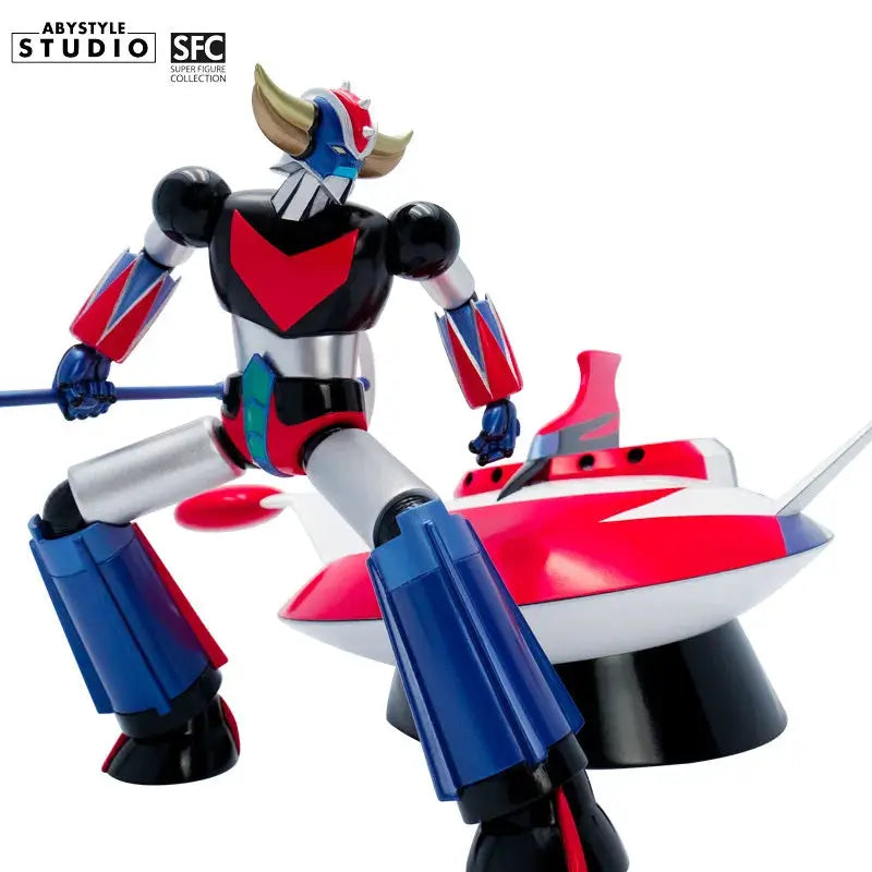 UFO Grendizer action figure by ABYSTYLE STUDIO; 1/10 statue with red V chest and blue limbs, includes spaceship