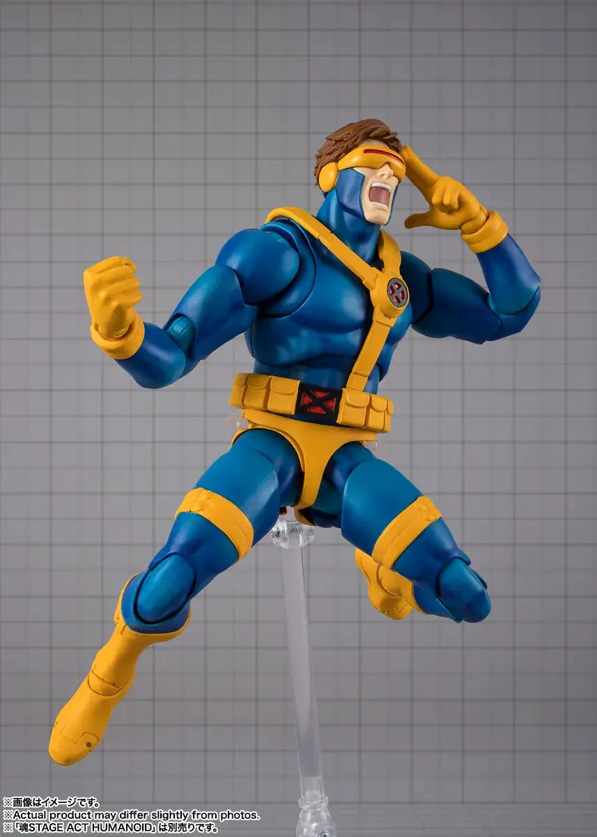 Cyclops S.H.Figuarts action figure by Bandai in blue and yellow Gamerverse suit on display stand.