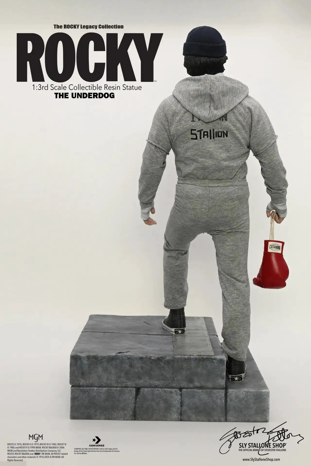 Rocky 1:3 scale resin statue (63cm) by SLYSTALLONESHOP; figure in gray tracksuit with red boxing glove.