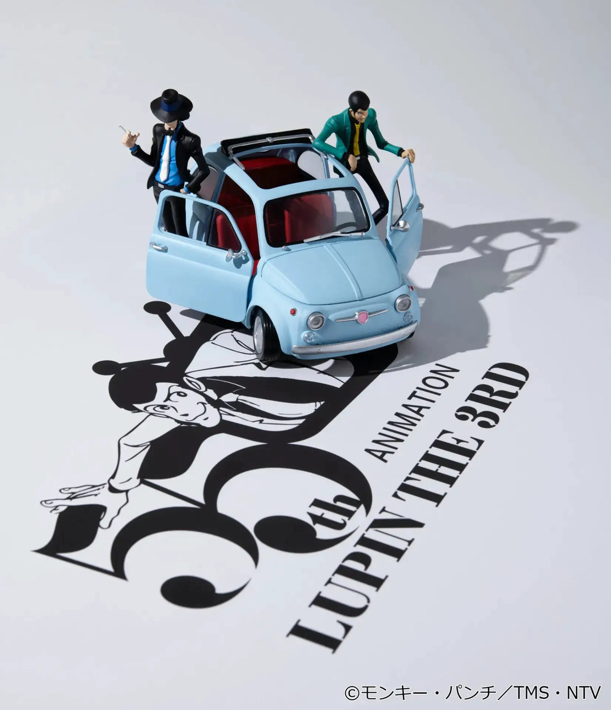 Lupin the 3rd Gallery 55th Limited Model MEGAHOUSE toy car with two figures on a light blue convertible, red interior.