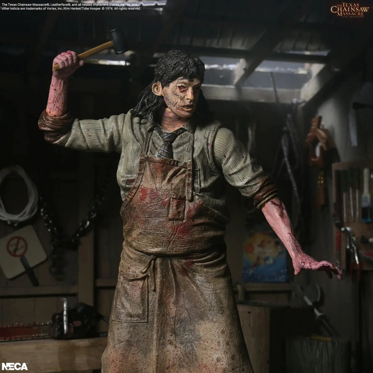 Leatherface action figure from The Texas Chainsaw Massacre The Beginning by NECA, bloodied shirt and apron, hammer