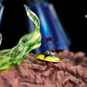 ONIRI CREATIONS UFO Robot Grendizer premium statue on rocky base with translucent green flame effect.