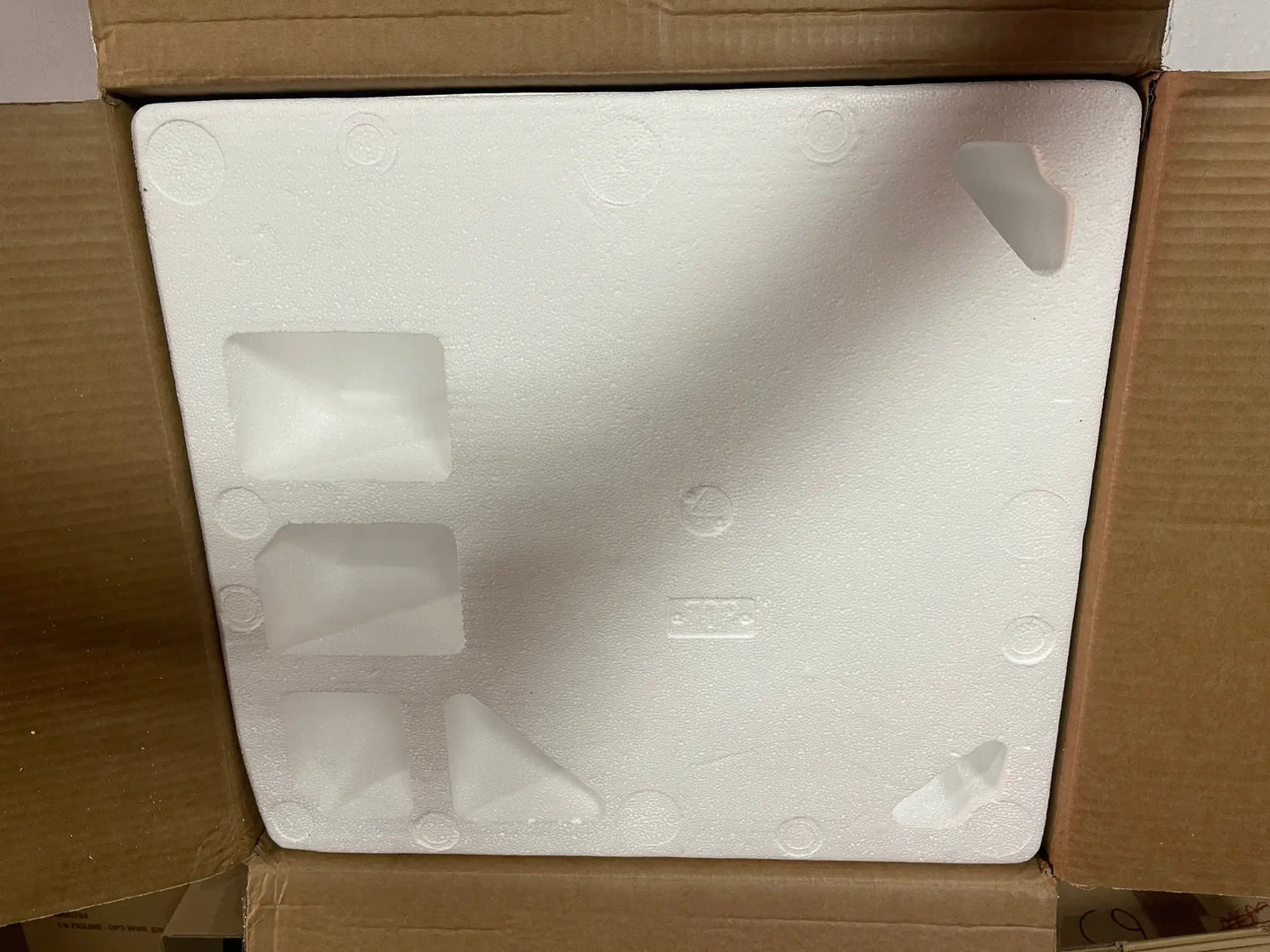 RoboCop helmet replica packaging in white Styrofoam insert inside a cardboard box