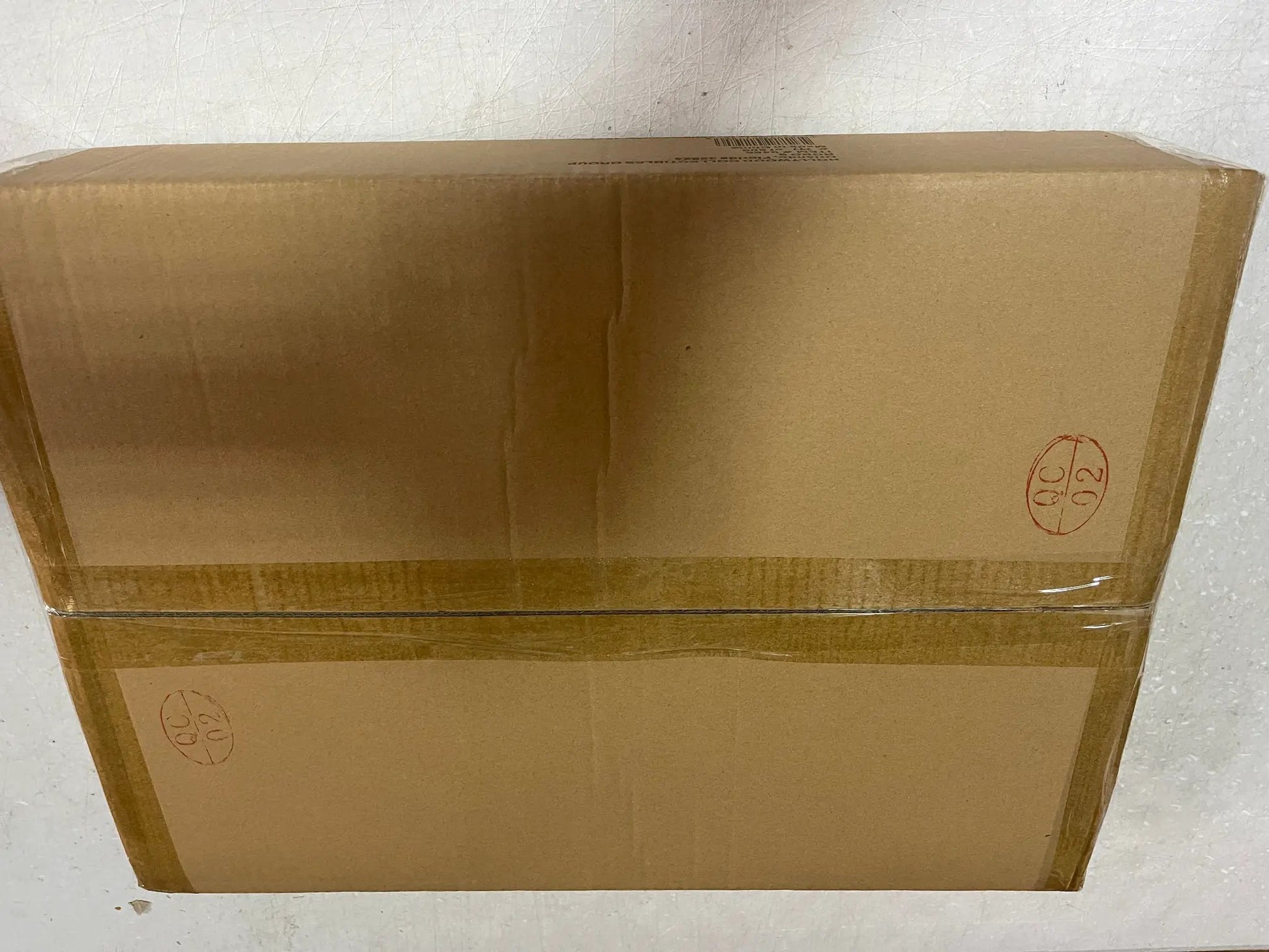 RoboCop replica packaging box; brown cardboard with red circular logos, Hollywood Collectables.