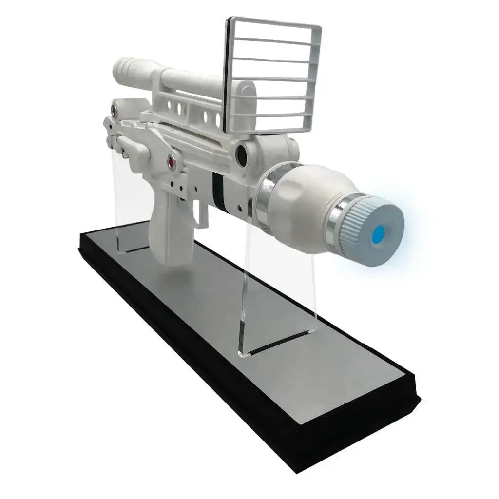 Moonraker prop replica rifle by Factory Entertainment on display stand, white-silver finish with blue tip.