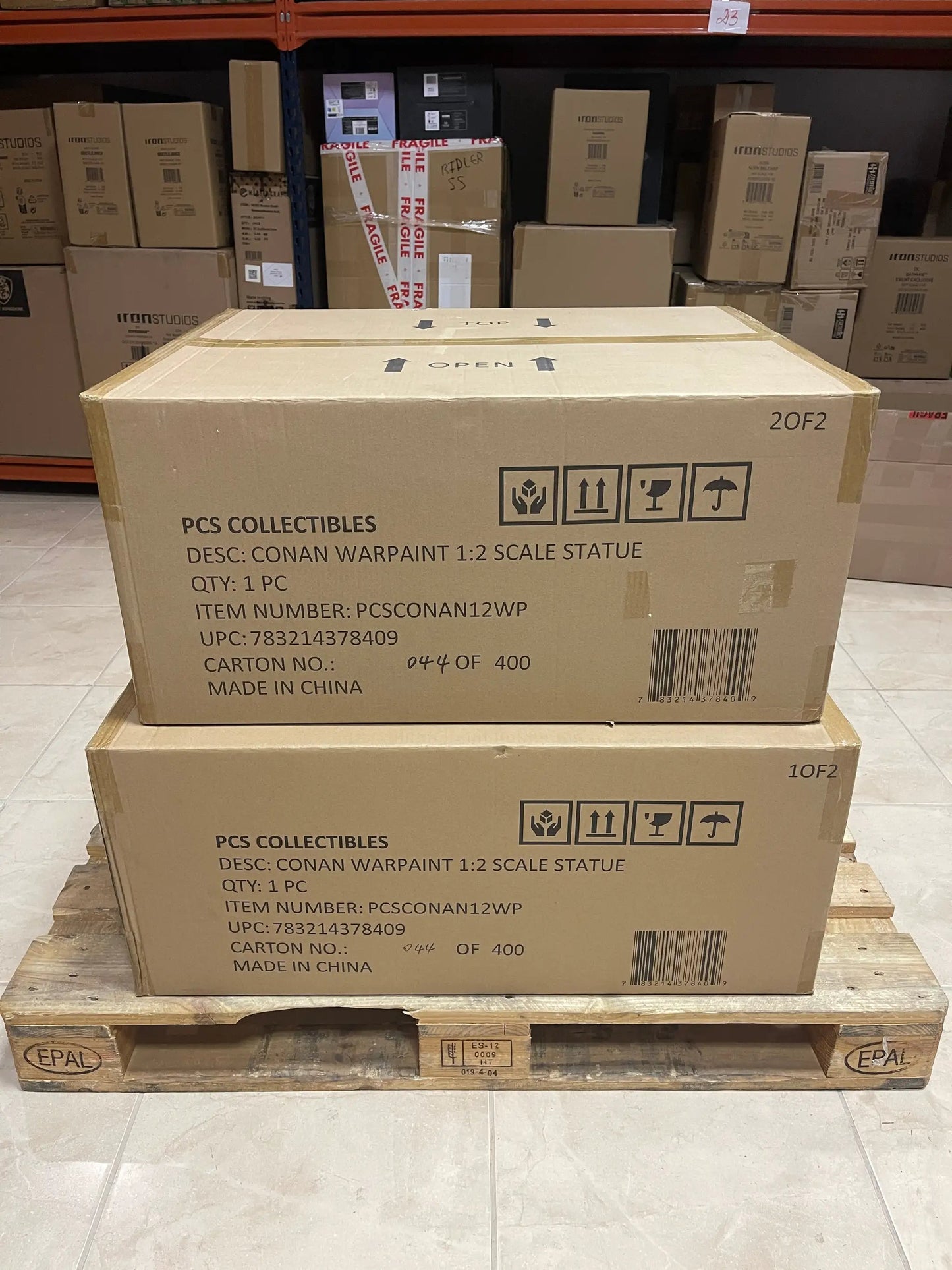 Conan Warpaint 1:2 Scale Statue box by PCS Collectibles on a pallet; two boxes visible.