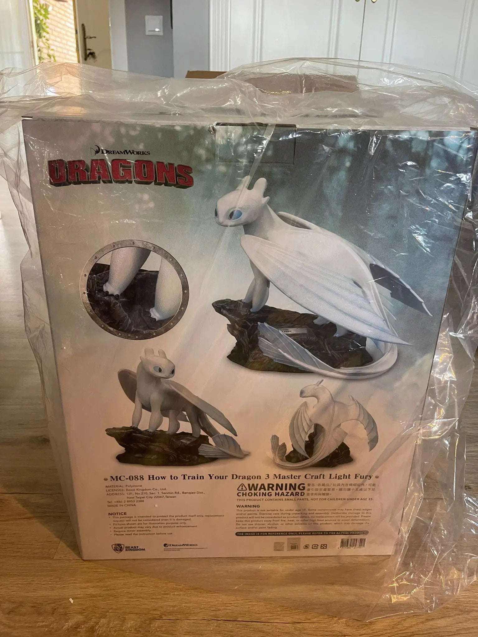 Light Fury Master Craft box featuring a white Light Fury dragon by Beast Kingdom DreamWorks Dragons, plastic wrapped.