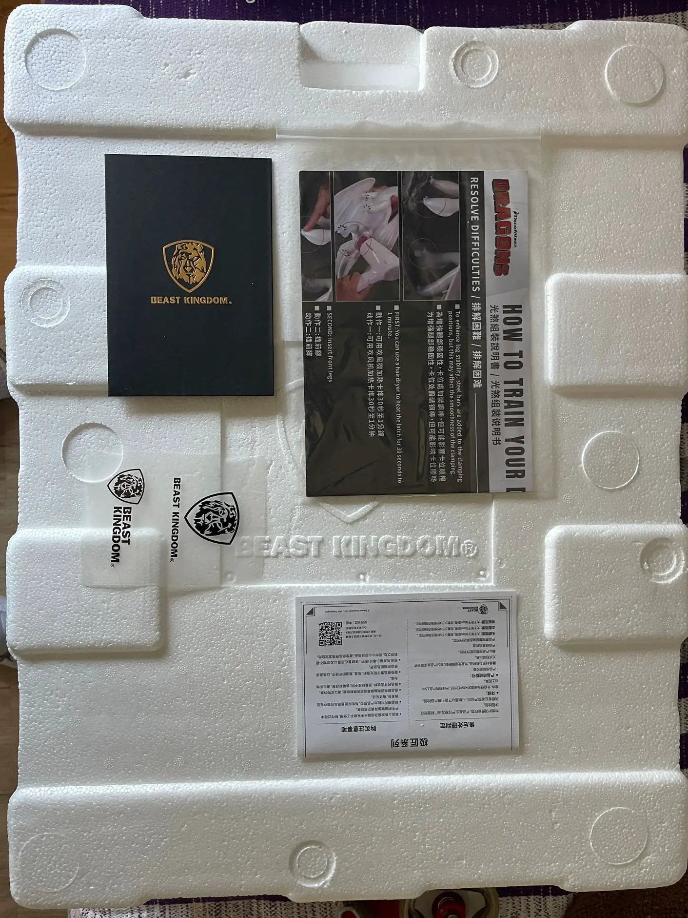 Beast Kingdom packaging for How to Train Your Dragon 3 Light Fury Master Craft in white styrofoam with booklet