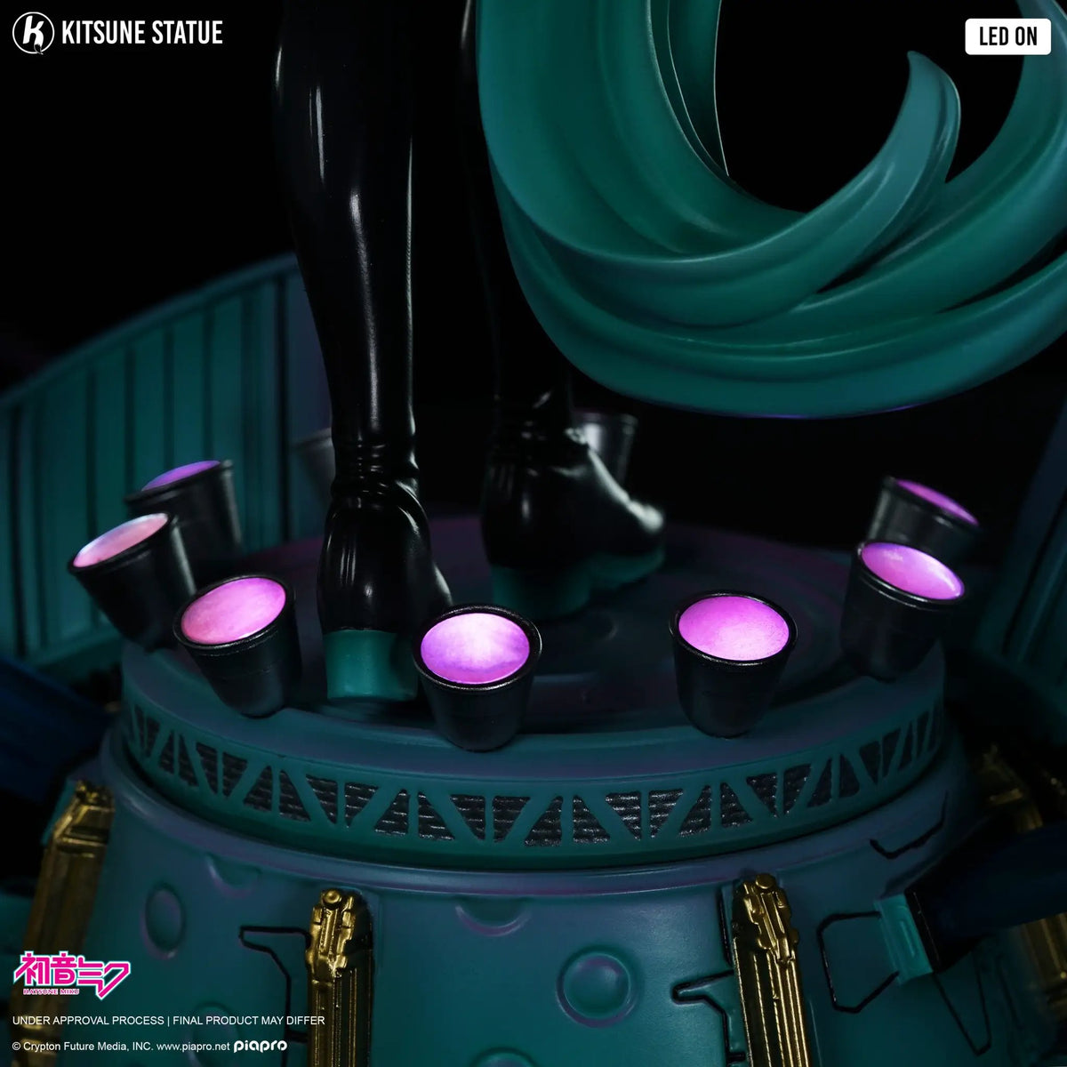 KITSUNE Miku 1/6 Kitsune Statue with teal cloak and black legs on a teal LED-lit base