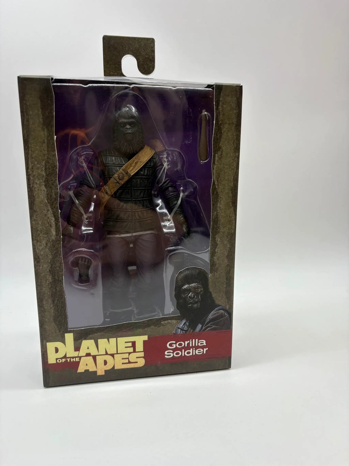 NECA Planet of the Apes Gorilla Soldier action figure, 18 cm, dark armored gorilla with brown strap, in window box