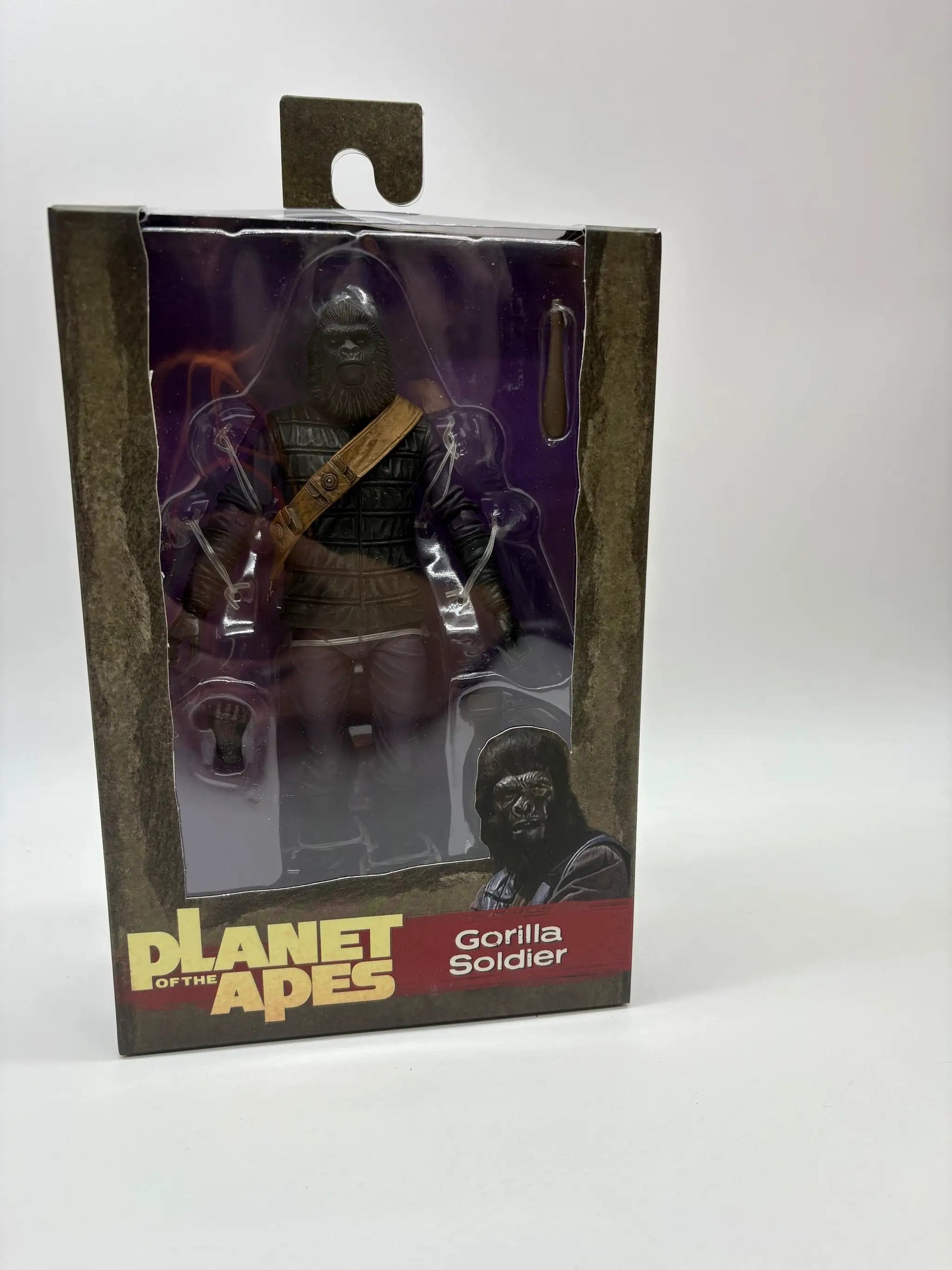 NECA Planet of the Apes Gorilla Soldier action figure, 18 cm, dark armored gorilla with brown strap, in window box