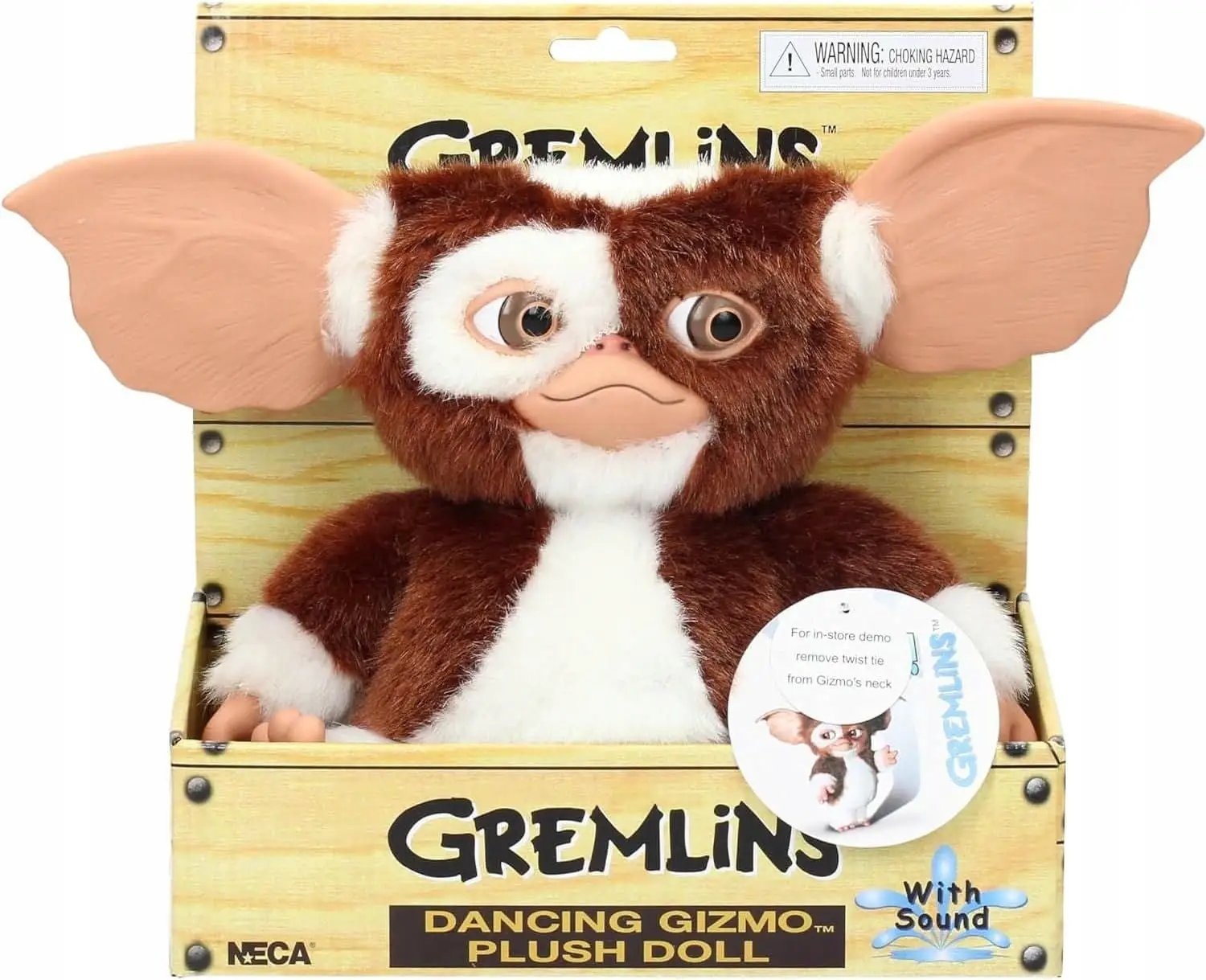 Gremlins Gizmo dancing plush by NECA, brown and white fur with large ears in crate