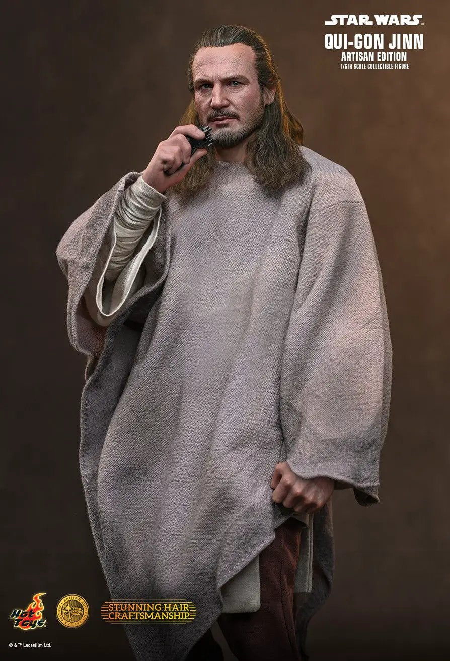 Hot Toys Star Wars Qui-Gon Jinn Artisan Edition 1/6-scale action figure in beige robe.