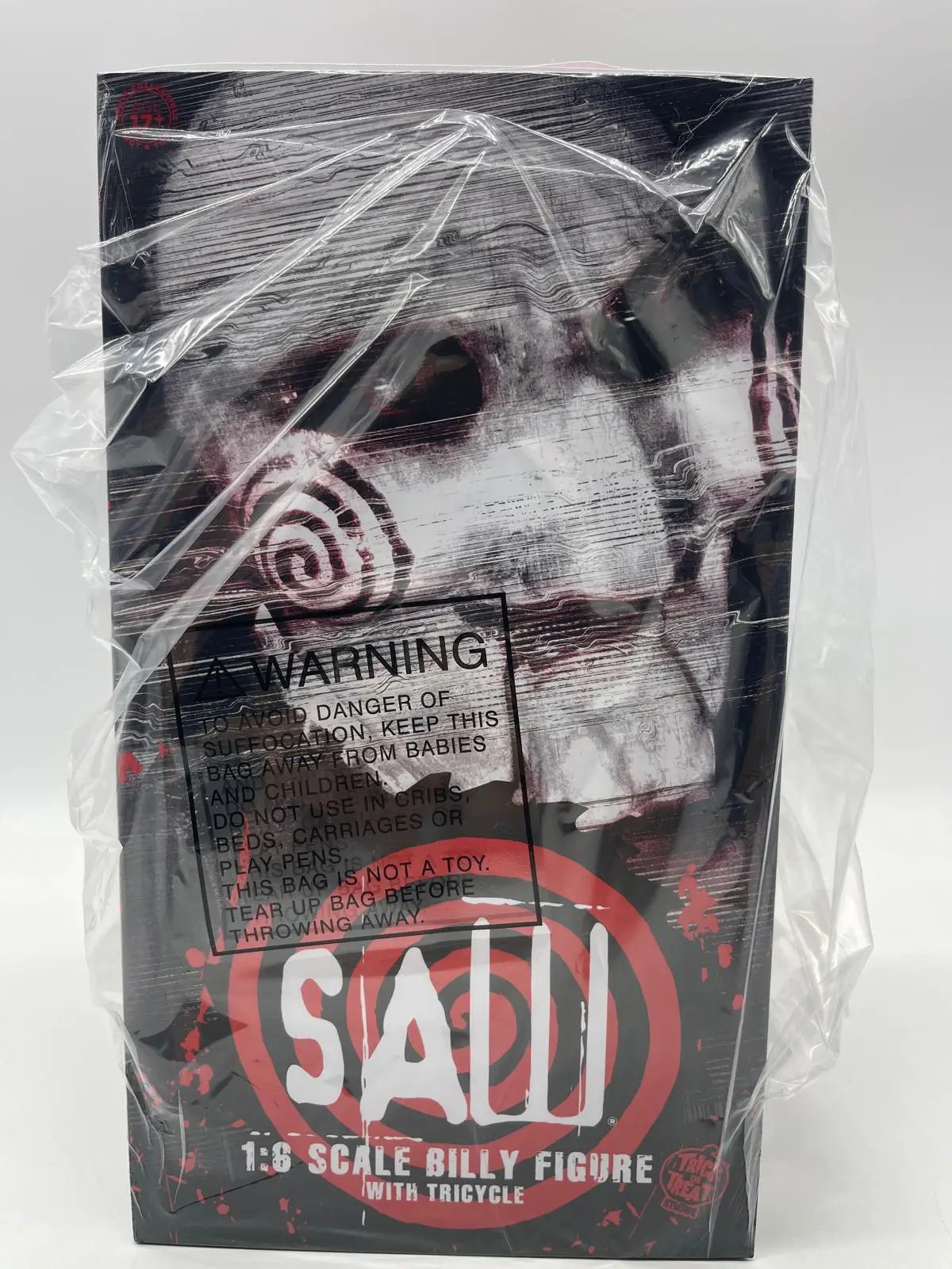 Saw Billy the Puppet 1:6 scale figure with tricycle by Trick or Treat Studios, boxed in black and red packaging