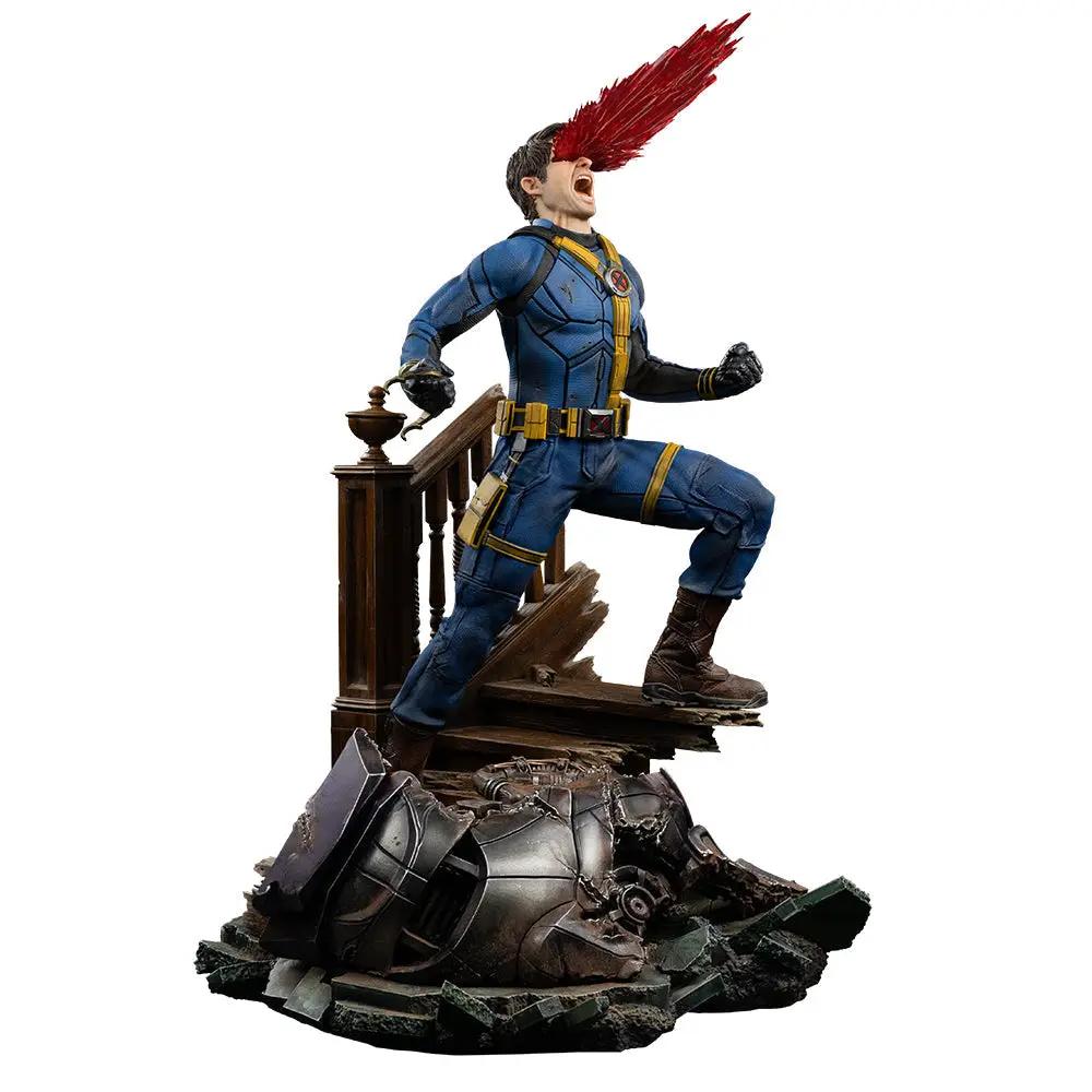 Statue Cyclops Deluxe ver. by Iron Studios, 1/4 scale, blue suit with red optic beam on rubble.