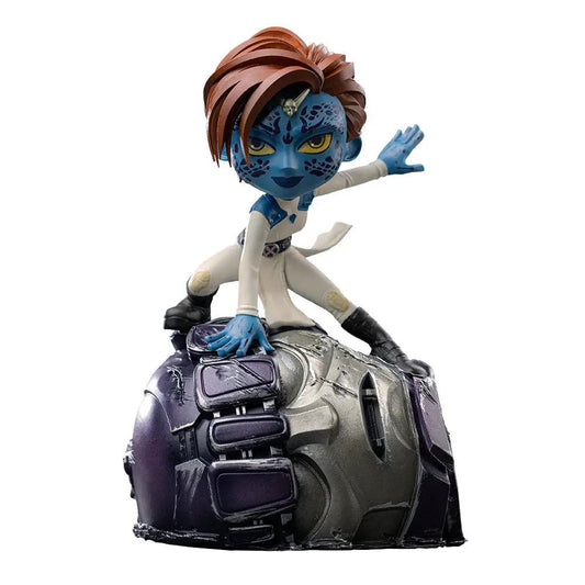 Statue Mystique by Iron Studios; blue-skinned Mystique in a white outfit crouching on a damaged purple base.