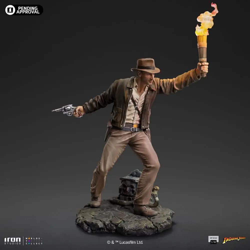 Indiana Jones statue 1/10 scale by Iron Studios; Indy with flaming torch and pistol on rocky base
