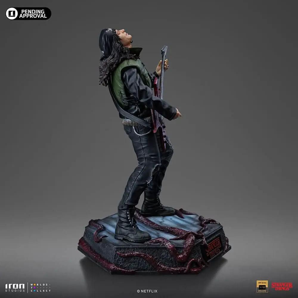 Statue Eddie Munson from Stranger Things, Iron Studios 1/10 scale; guitarist with black leather jacket, green vest.