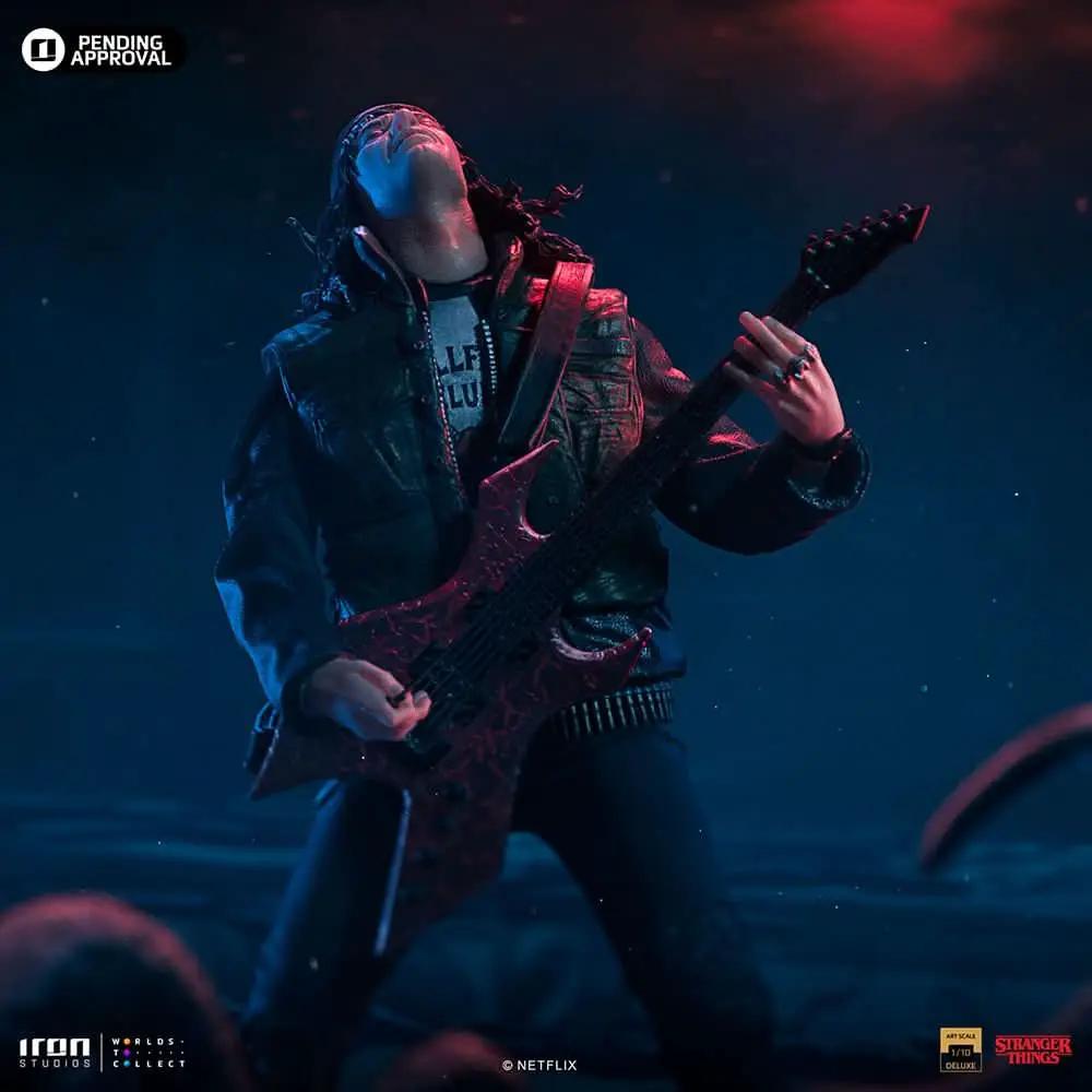 Statue Eddie action figure by IRON STUDIOS from Stranger Things, 1/10 scale with red electric guitar.