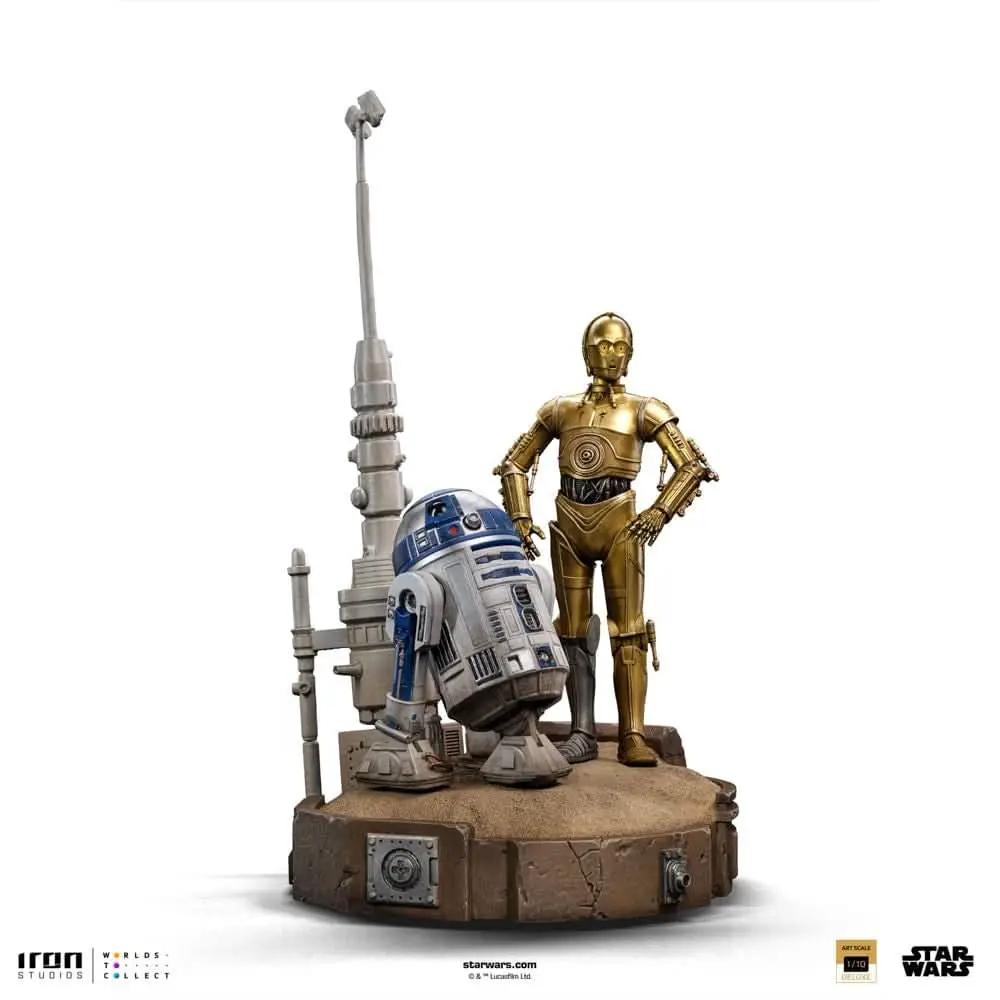 C-3PO and R2-D2 two-droid statue by Iron Studios, Star Wars Art Scale 1/10, gold and blue/white droids on a desert base.