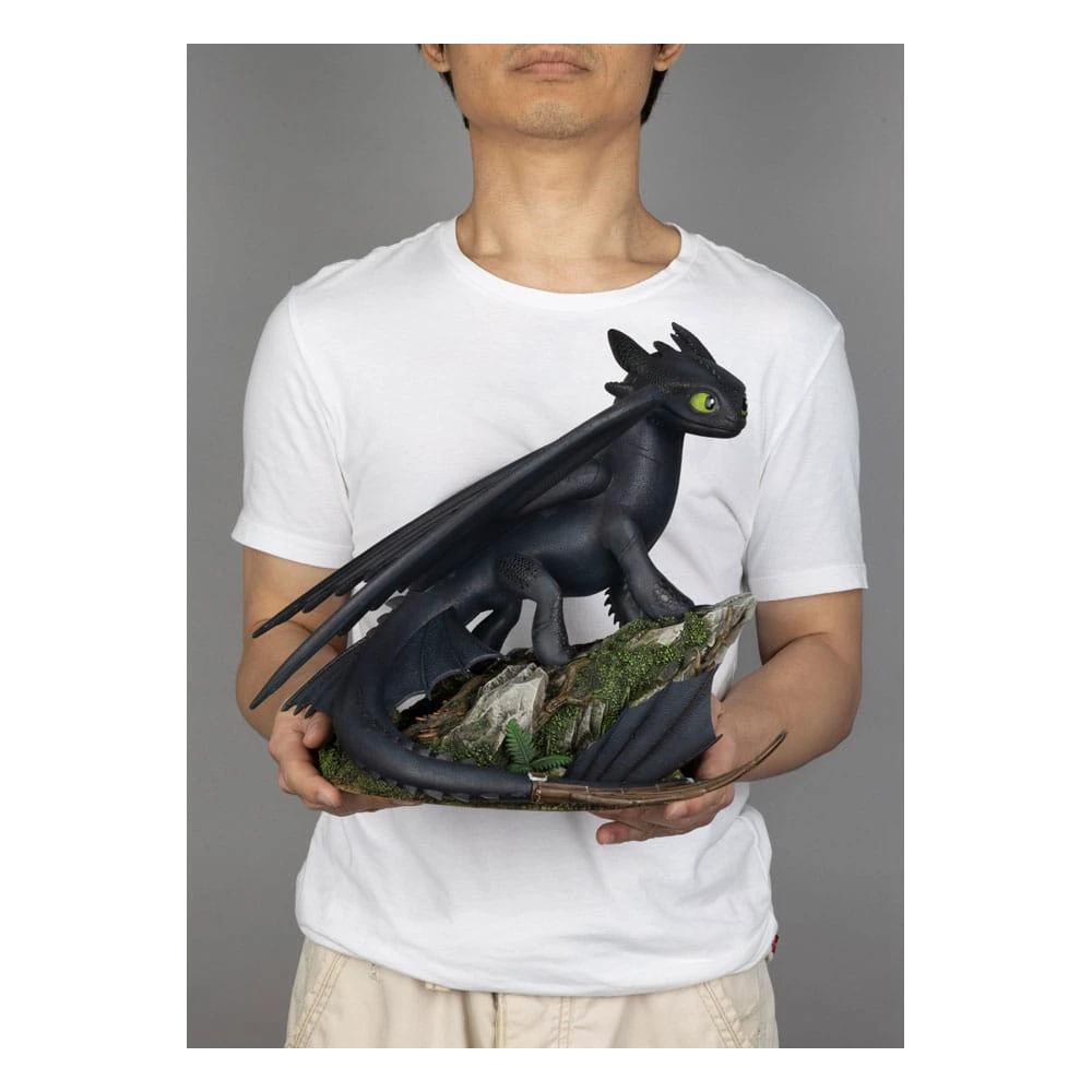 BEAST KINGDOM Toothless Master Craft dragon statue, standing black figurine with green eyes on rocky base, 31 cm