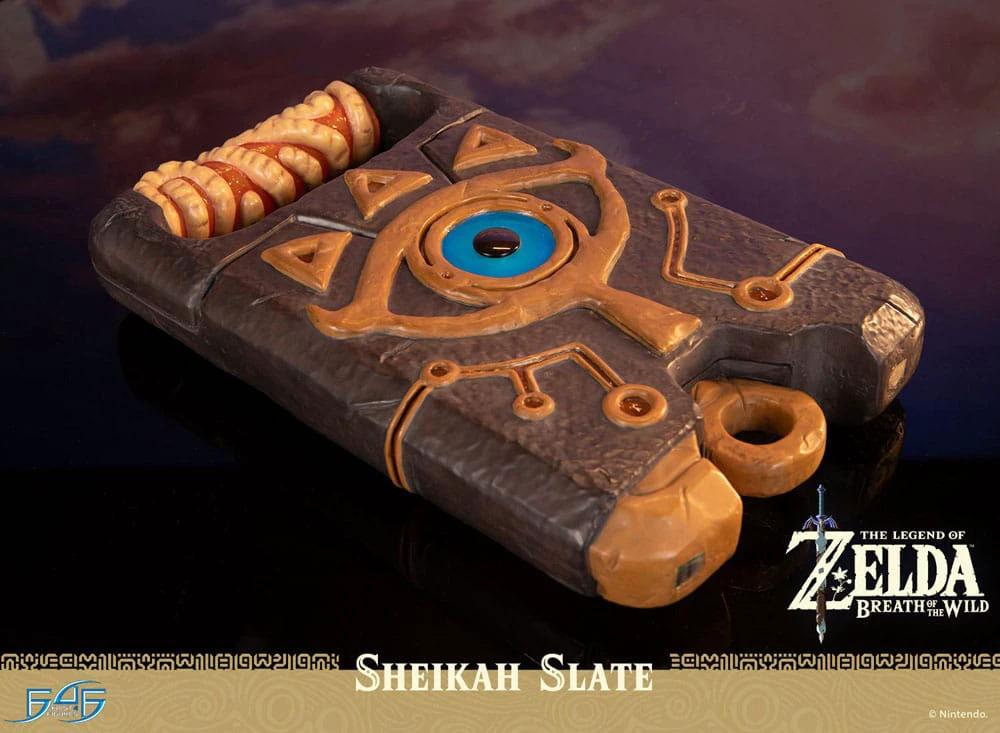 Sheikah Slate collectible by FIRST 4 FIGURES from The Legend of Zelda: Breath of the Wild, brown stone with blue eye
